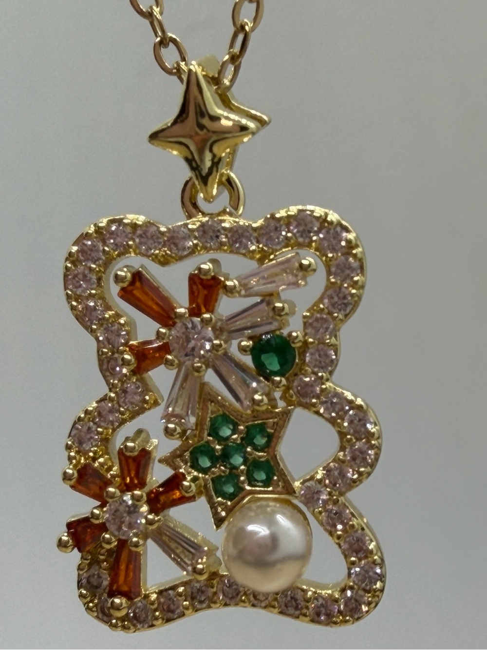 Gold-tone Floral Pendant Necklace with Green, Red and Pearl Accents